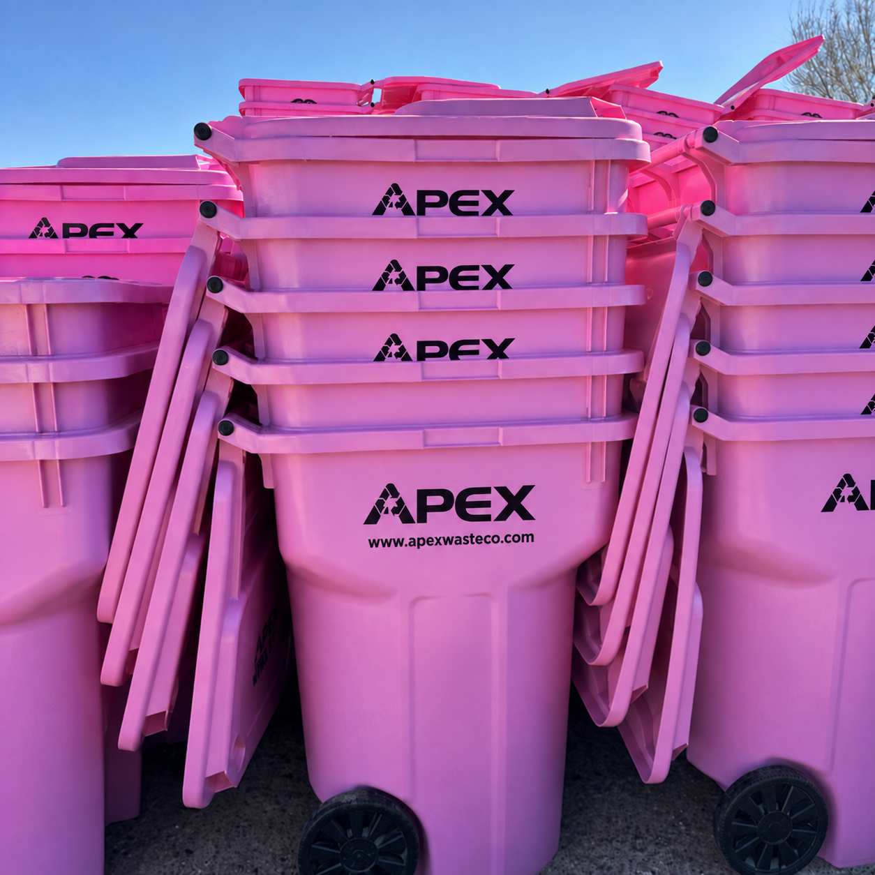 Stacks of Apex Pink Tote trash carts